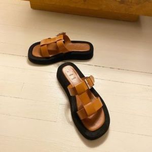 BYM brown slides